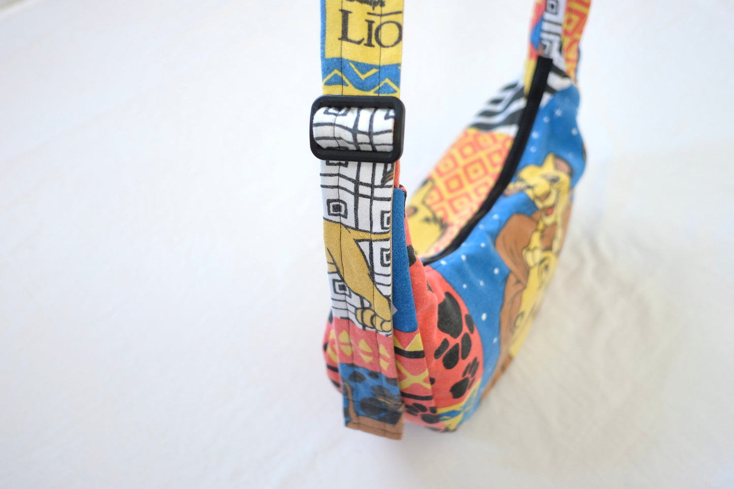 lion sling bag